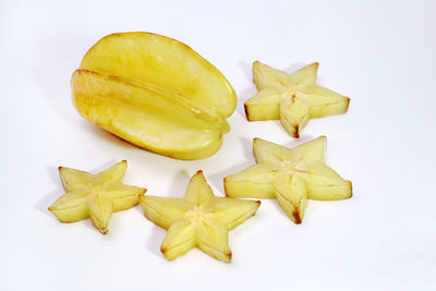 High angle view of chopped leaf against white background