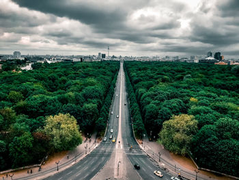 High angle view of road by trees against sky