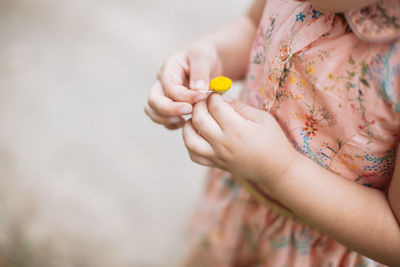 Close-up of girl with flower 