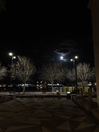 Illuminated street at night