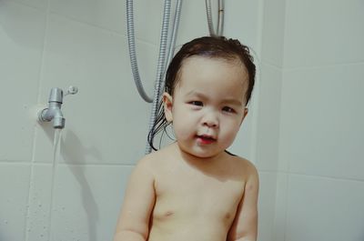 Cute baby boy in bathroom