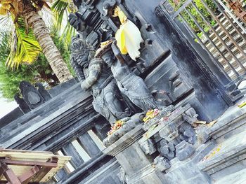 High angle view of buddha statue in temple