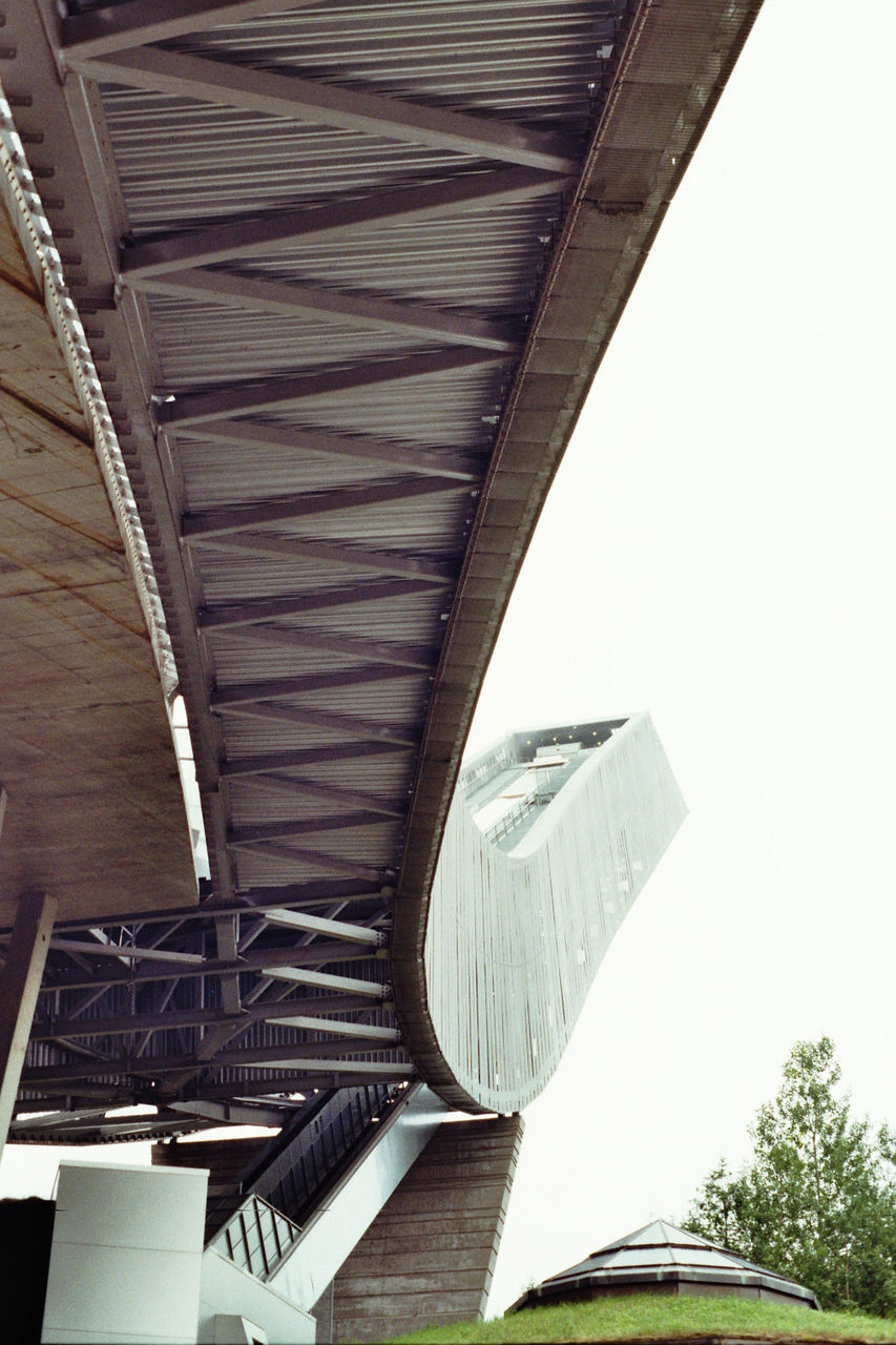 architecture, built structure, low angle view, building, directly below, day, no people, outdoors, modern, sky, architectural feature, part of