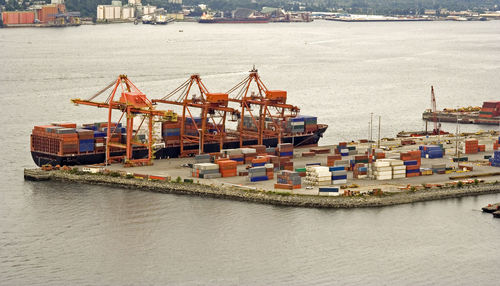 High angle view of commercial dock amidst sea