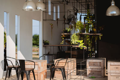 Empty chairs and tables in cafe