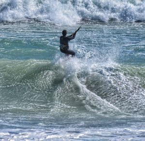 Man surfing in sea