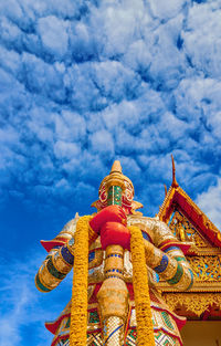 Low angle view of temple against building