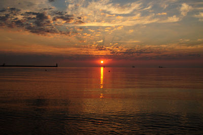 Dramatic sky over sea during sunset