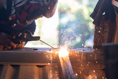 Welder, welding automotive part in a car factory