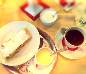 Close-up of cappuccino served on table