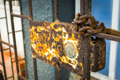 Close-up of rusty metal gate