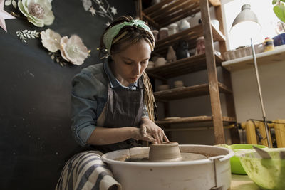 Craftsperson working at workshop