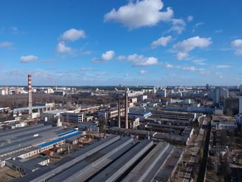 High angle view of railroad tracks amidst buildings in city