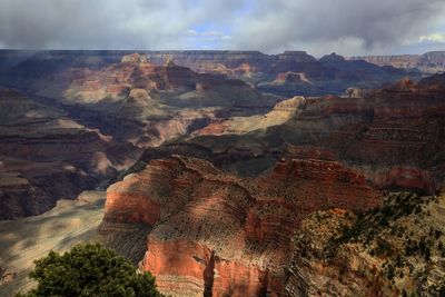 Rocky mountains against cloudy sky at grand canyon national park