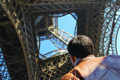 Low angle view of man against sky