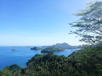 Scenic view of sea against clear blue sky