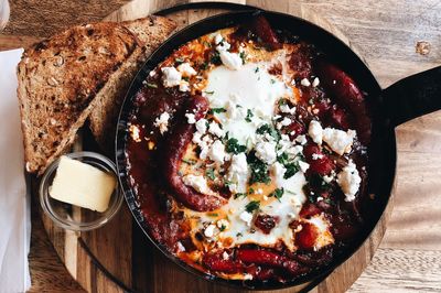 Directly above shot of food in frying pan on table