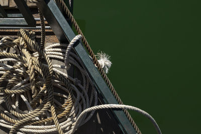 Low angle view of rope tied up of metallic structure