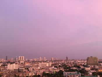 High angle view of buildings against clear sky