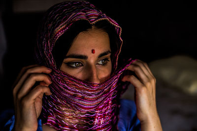 Close-up portrait of young woman