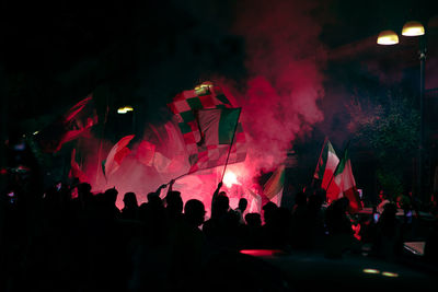 Crowd at night flags for victory euro2020 italian 