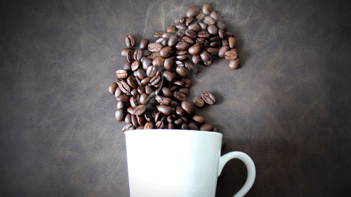 High angle view of coffee cup on table