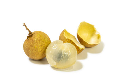 Close-up of fruits against white background