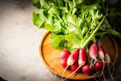 High angle view of strawberries in bowl on table