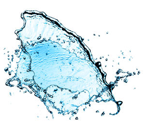 Close-up of water splashing against blue background