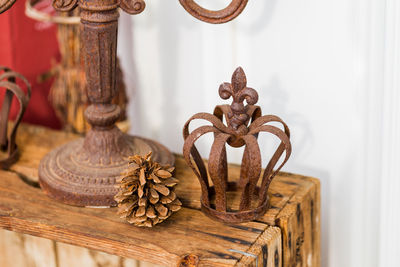 Close-up of metal decoration on table