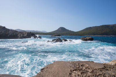 Scenic view of sea against clear sky