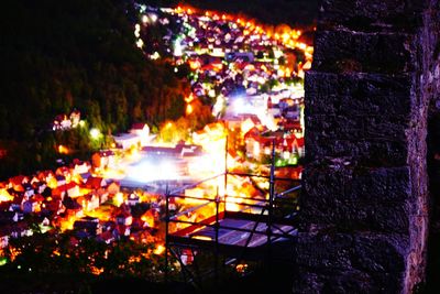 Illuminated buildings in city at night