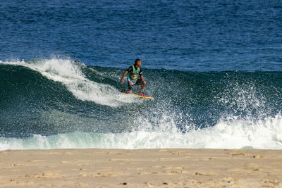 Man surfing in sea