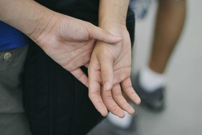 Close-up of couple hands