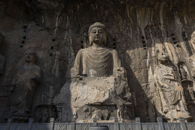 Low angle view of buddha statue