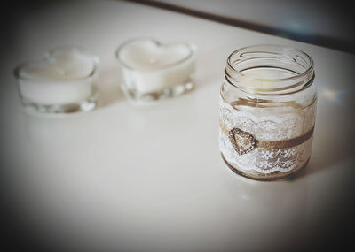 Close-up of glass of jar on table