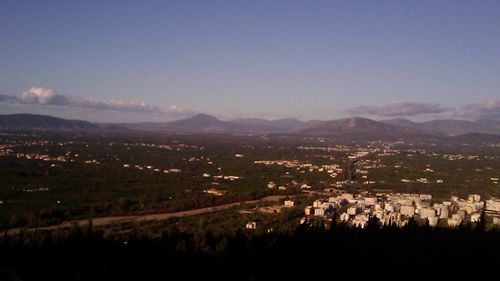 Landscape with mountain range in background