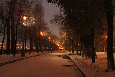 View of illuminated street at night