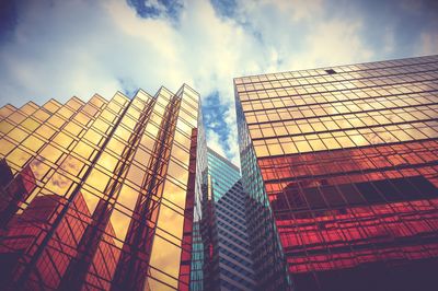 Low angle view of skyscrapers against sky