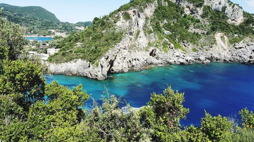 High angle view of sea against blue sky