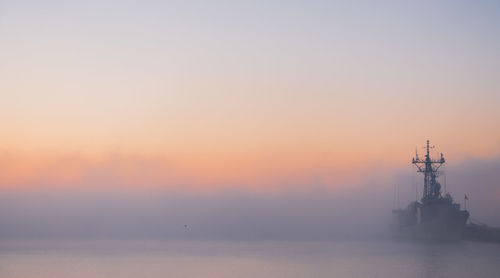 Scenic view of seascape against sky during sunset