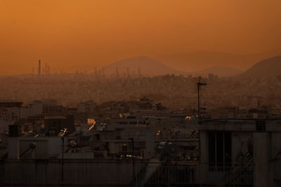 High angle view of townscape against sky during sunset