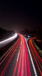 Light trails on road at night