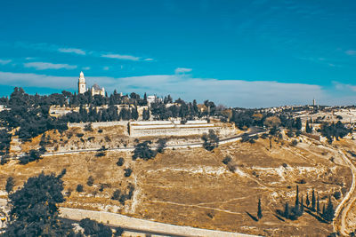 View of old ruins against blue sky