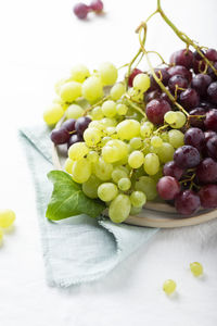 Close-up of grapes on table