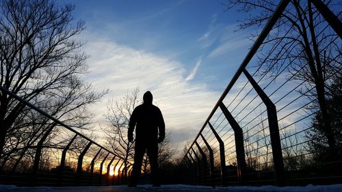 Silhouette of man at sunset