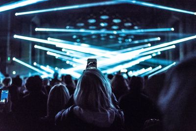 Rear view of people at music concert