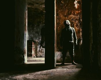 Man standing in corridor