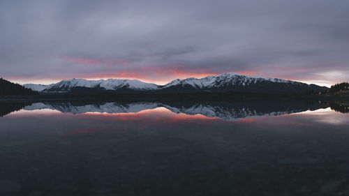 Unbelievable sunrise at lake tekapo, southern alps, new zealand