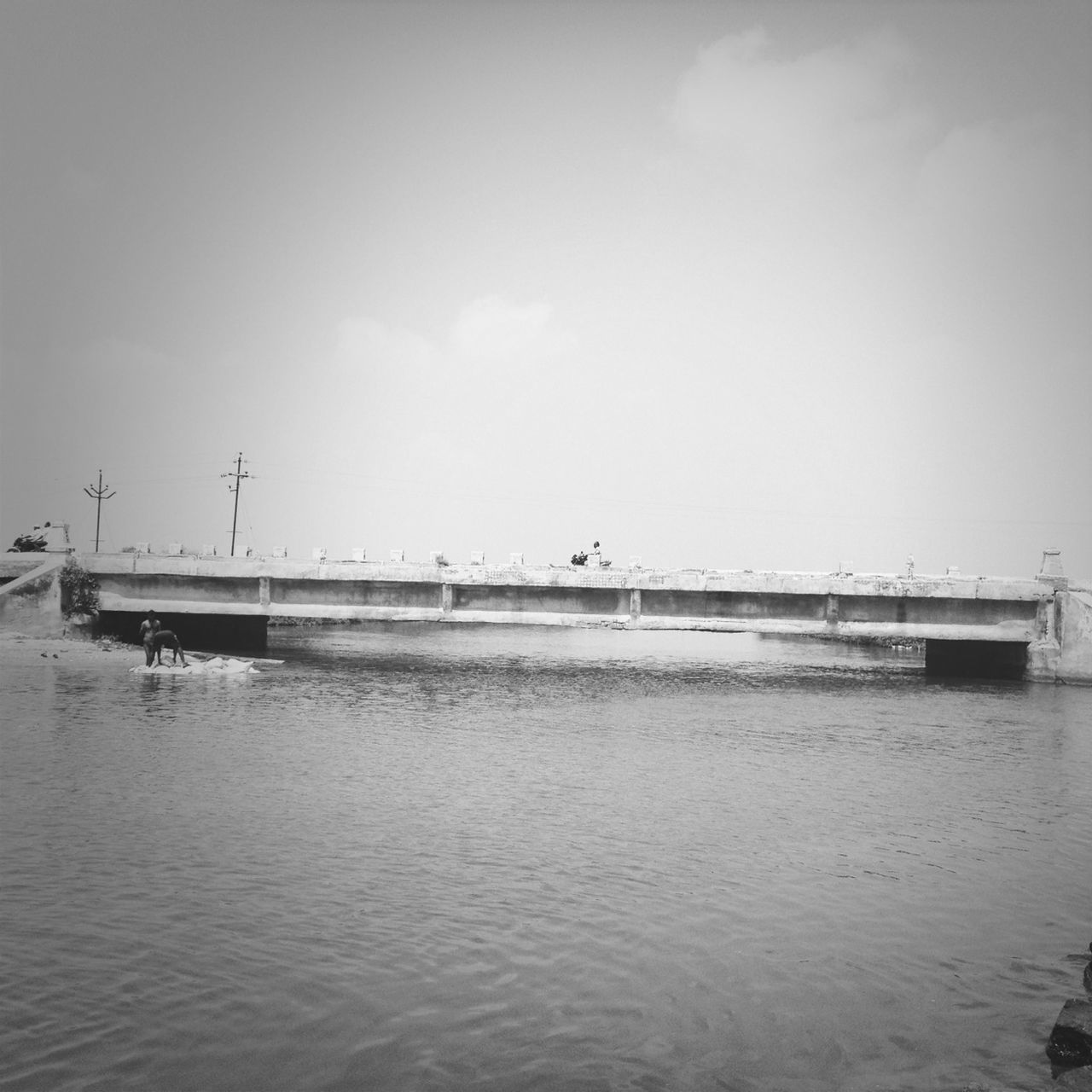 water, waterfront, sea, transportation, sky, built structure, nautical vessel, architecture, copy space, rippled, mode of transport, nature, boat, tranquility, connection, tranquil scene, river, day, pier, outdoors